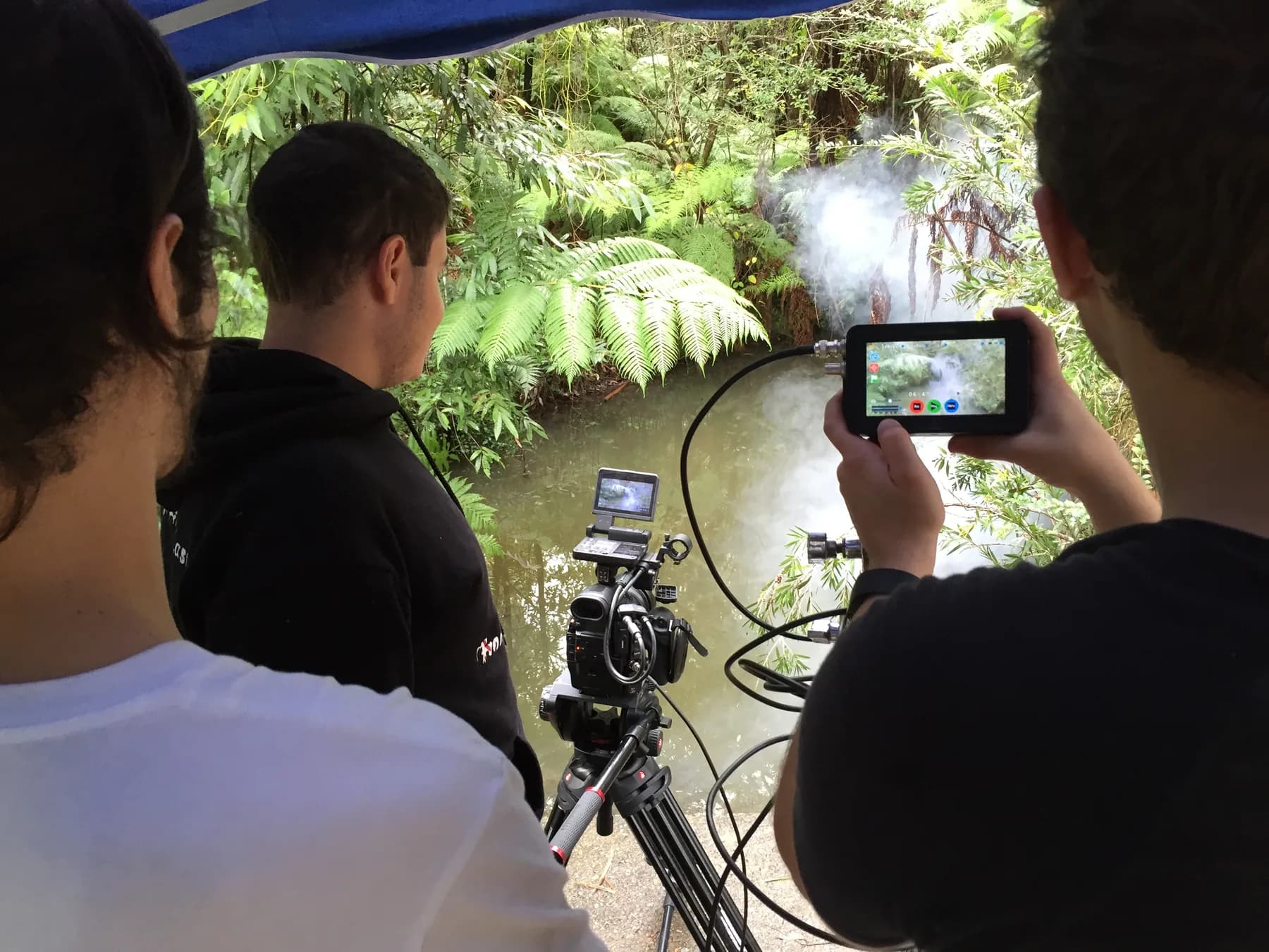 Camera crew preparing a forest setup