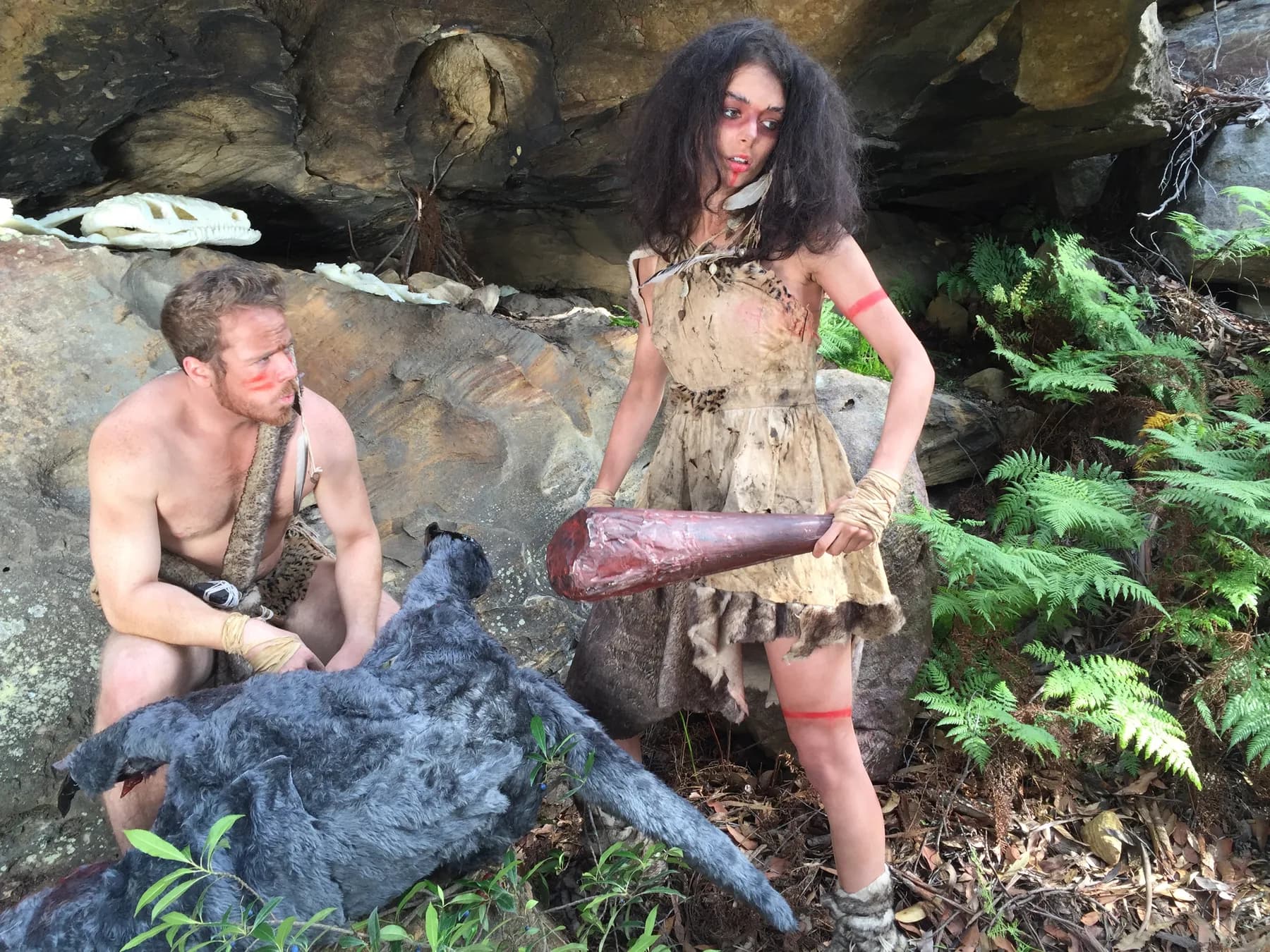 A production portrait of the two prehistoric characters