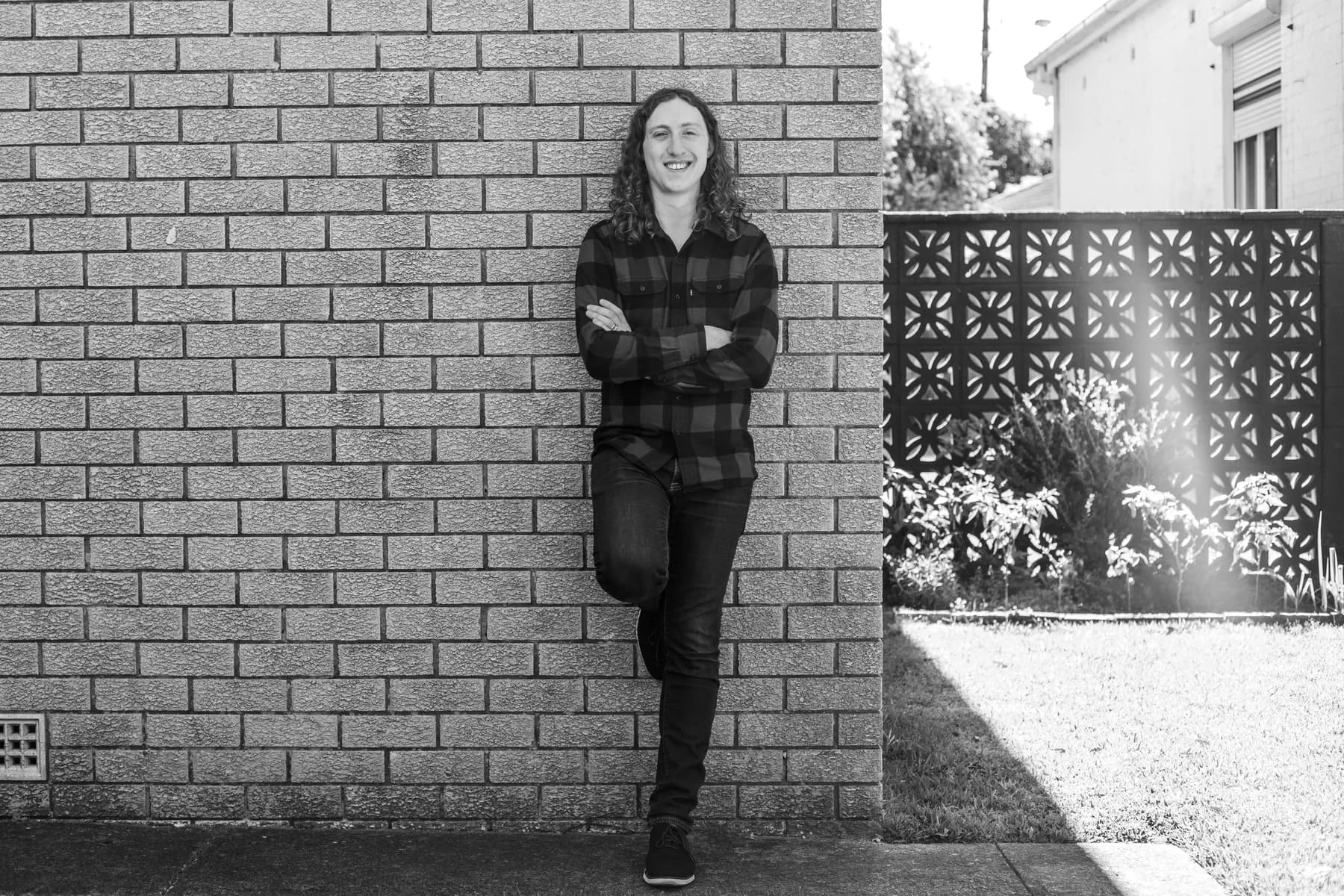 Full-length black-and-white author portrait