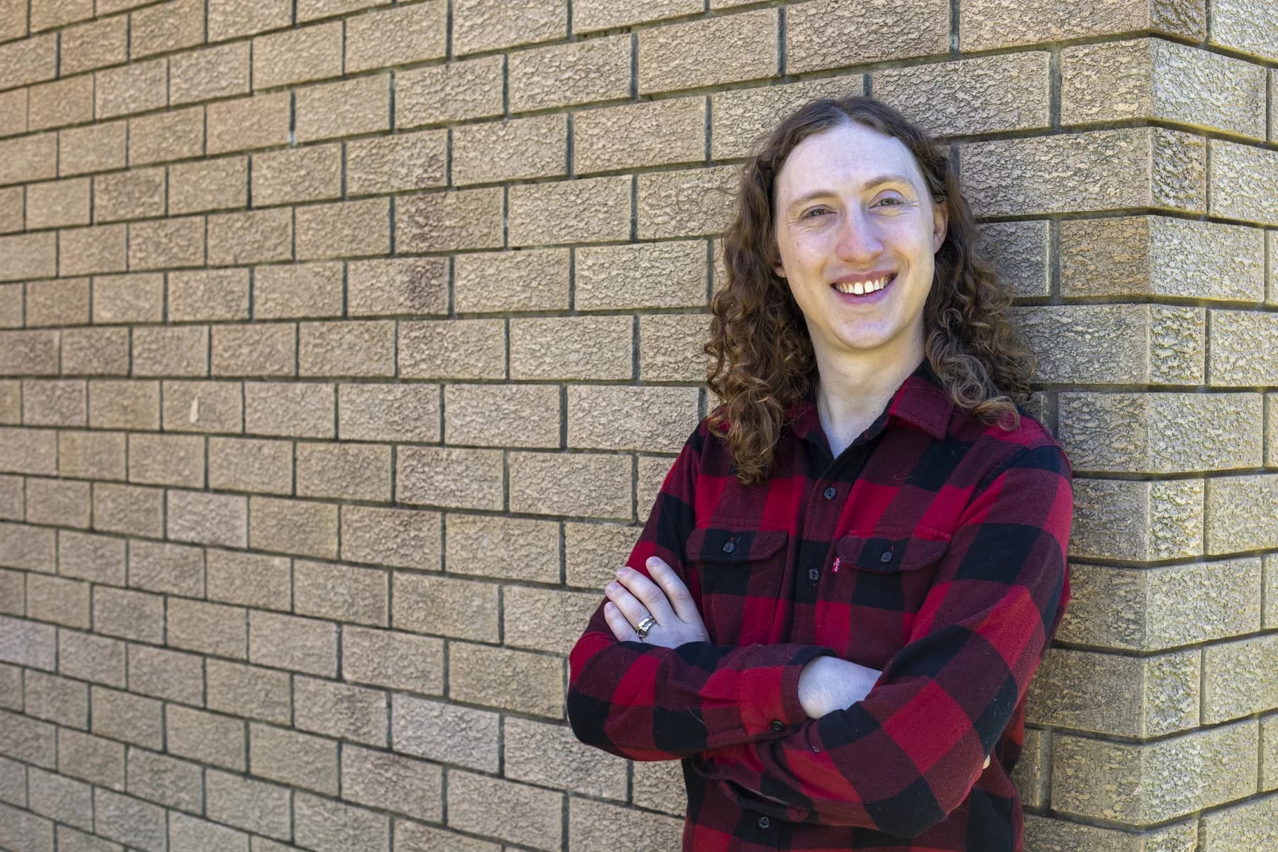Relaxed colour author portrait of Jordan King-Lacroix