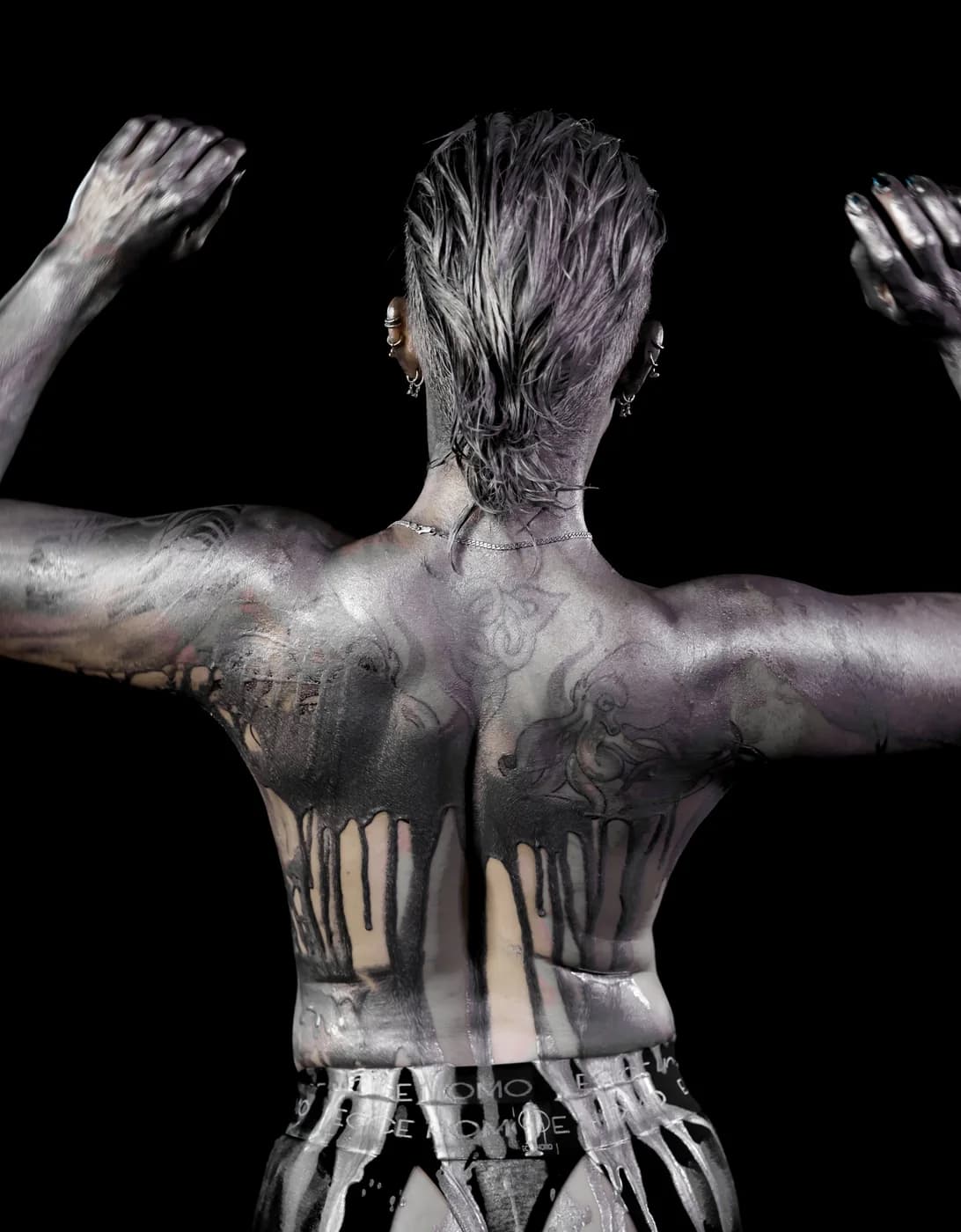 Painted back and tattoos in the liquid-metal portrait series