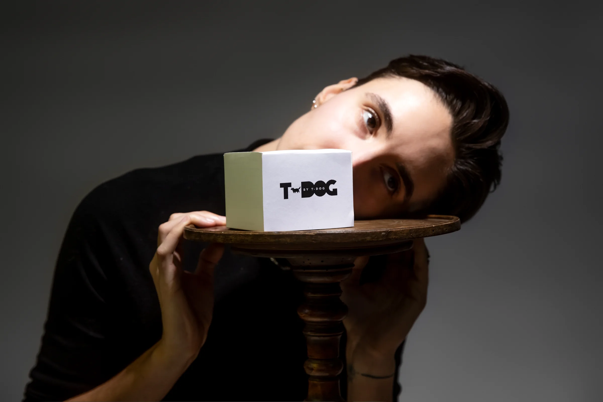 T-Dog Extreme posed beside a branded cube