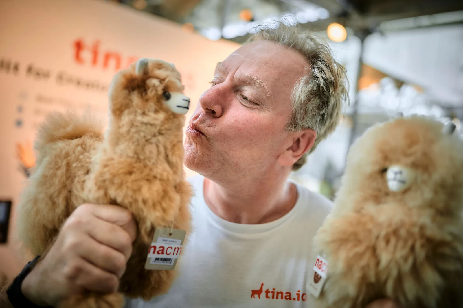 TinaCMS llama plushies at a conference