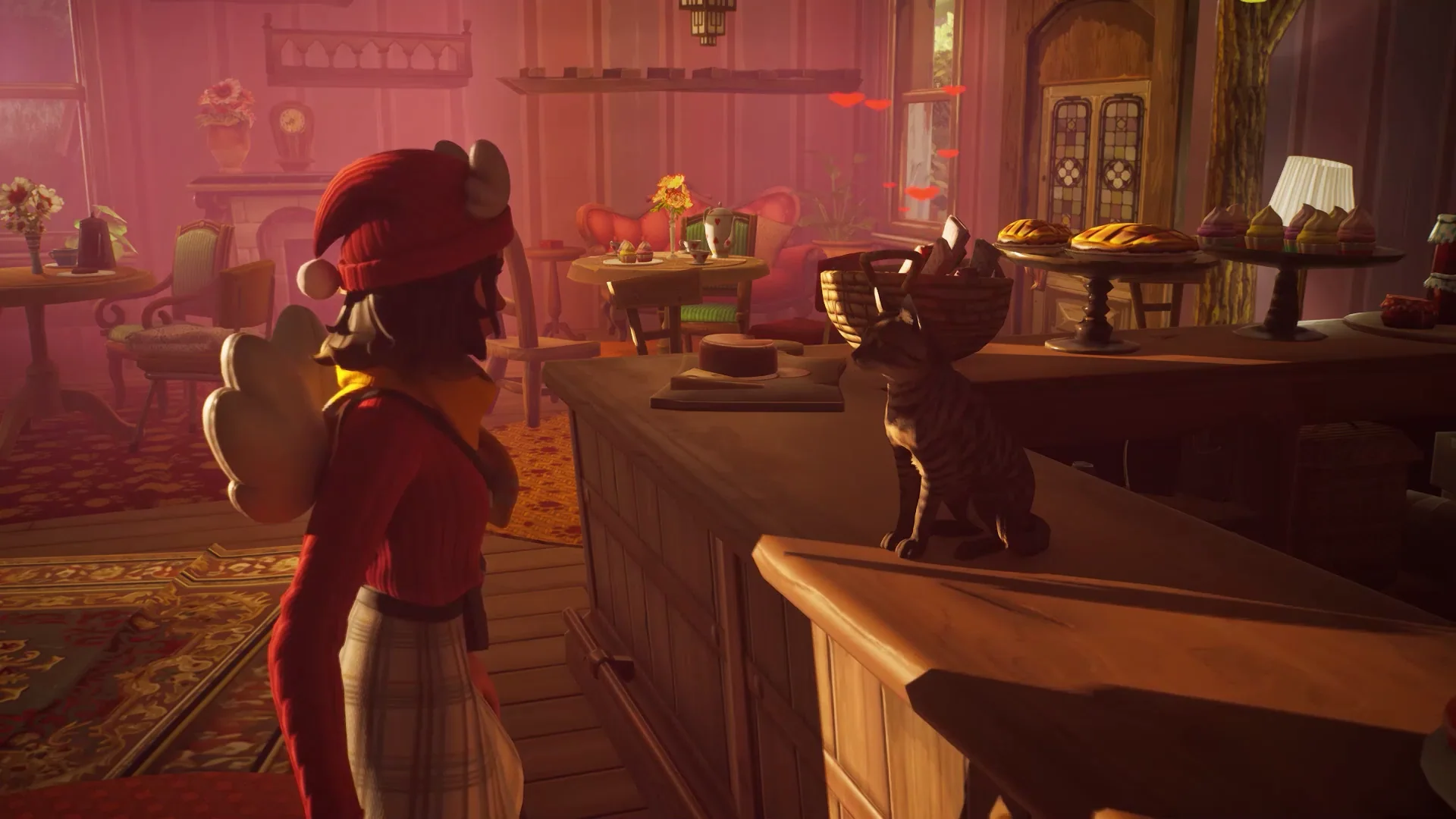 A player meeting a cat inside the warmly lit Cat Cafe