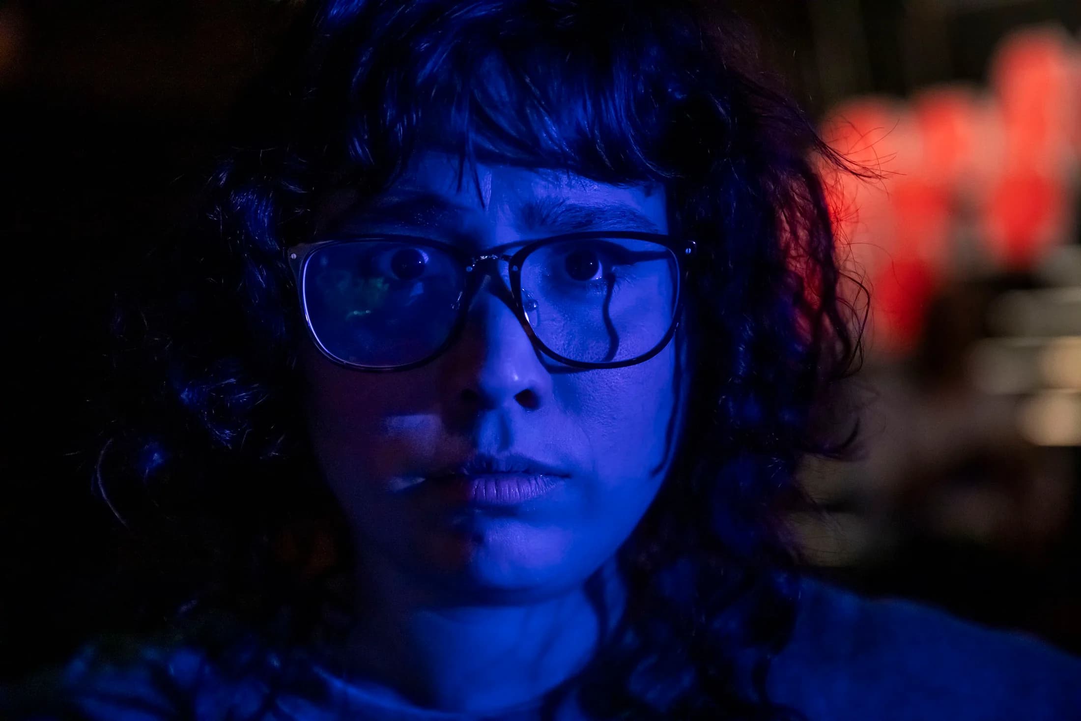 Inge Berman lit by blue and red projection light