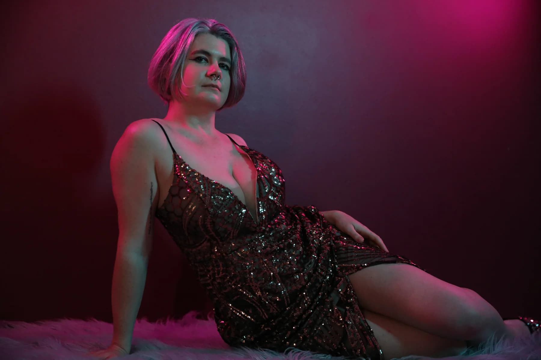 Mercury reclining in a sequinned dress