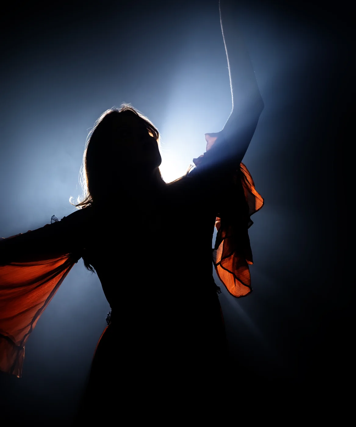 Silhouette with flowing fabric